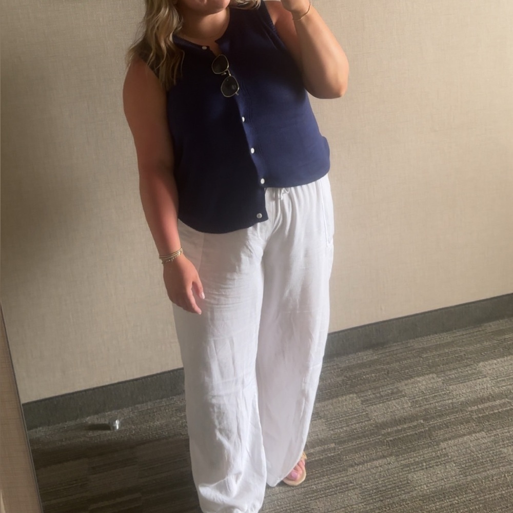 White Sleeveless Button-Down Shirt